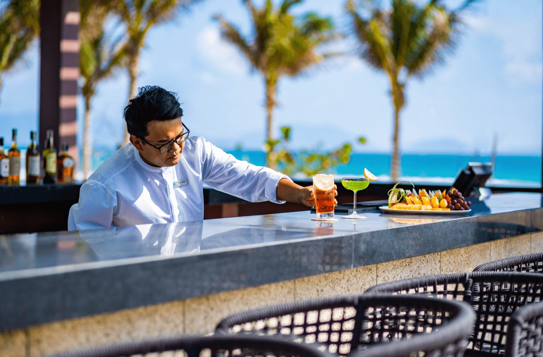 7 Best Beaches in Cam Ranh vs Nha Trang in 2026 17 Calm crystal-clear sea with gentle waves and blue skies, highlighting the peaceful atmosphere of Cam Ranh beaches.