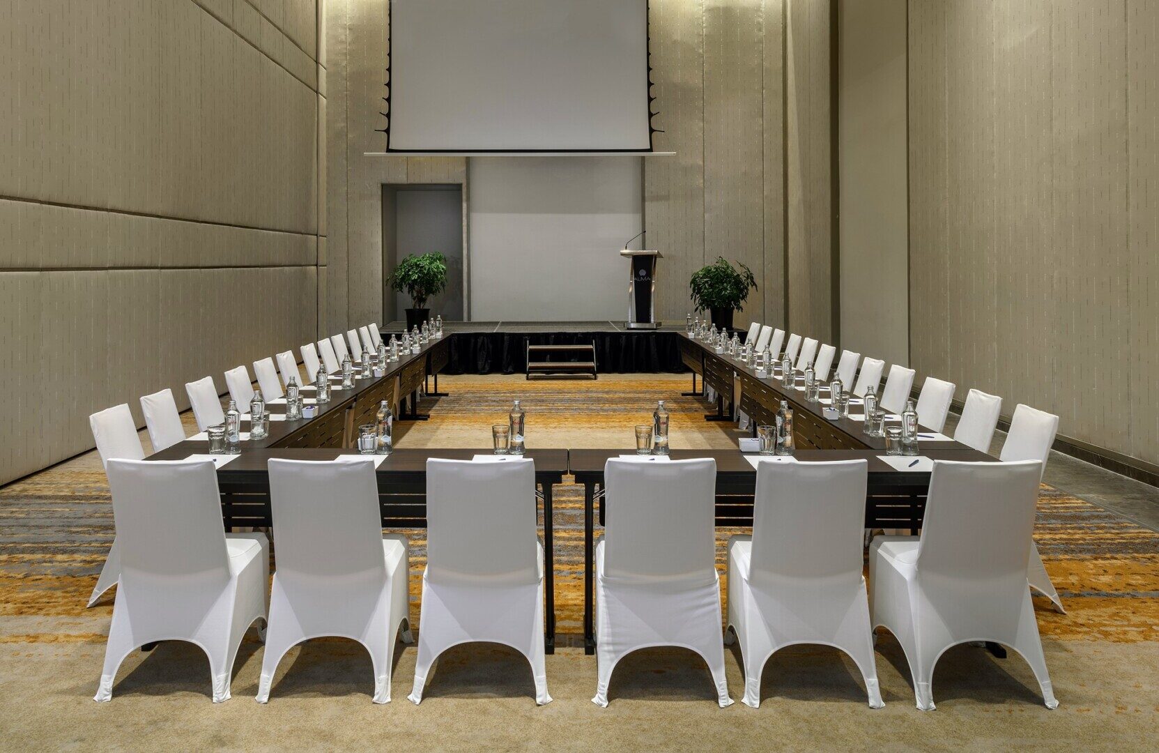 Top 10 Corporate Venues in Cam Ranh for Retreats & Events in 2026 7 Executive meeting room with natural light and advanced AV equipment, representing high-end corporate venues in Cam Ranh.